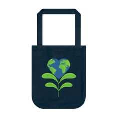 a blue bag with a green heart shaped plant and the world in it's center