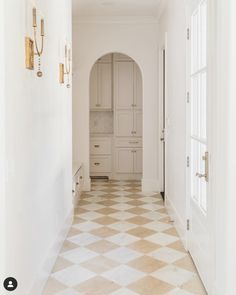 the hallway is clean and ready for us to use as an entrance way in this home