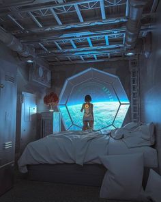 there is a woman standing on the bed looking out at the view from inside a space station