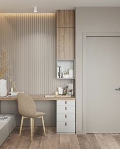 a room with a desk, chair and shelves on the wall in front of it