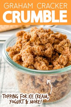 a glass bowl filled with crumbled food on top of a table