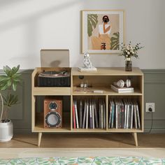 Vinyl Record Rack and Storage: Features an elegant multi-purpose design that can easily blend into different environments. Its classic look and color complement a variety of home styles. Not only can it be used as a vinyl storage cabinet, the mid-century modern turntable rack with record storage can also be used as a decorative piece or small piece of furniture to add a unique touch to your room. George Oliver Color: Wood | George Oliver Audio Rack, Record Player Stand w / Charging Station & Usb Modern Turntable, Vinyl Record Rack, Record Rack, Record Player Stand, Audio Rack, Vinyl Storage, Record Storage, Media Storage, Color Complement