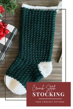 a green and white stocking sitting on top of a wooden table