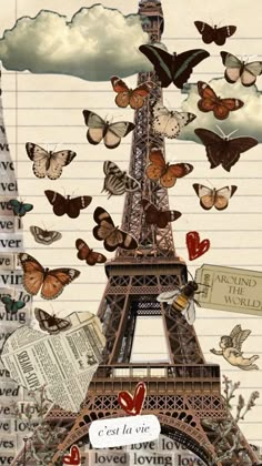 the eiffel tower is surrounded by butterflies