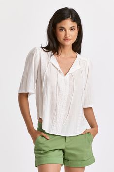 warner-lace-trim-blouse-white Casual Tie Neck Top For Vacation, Casual Tie Neck Tops For Summer, Chic Tie Neck Tops For Vacation, Spring Beach Tie Neck Tops, Spring Tie Neck Top For Beach, Casual Cotton Tie Neck Blouse, Casual Cotton Tie-neck Blouse, White Tie Neck Cotton Top, Cotton Tie Neck Blouse For Daywear