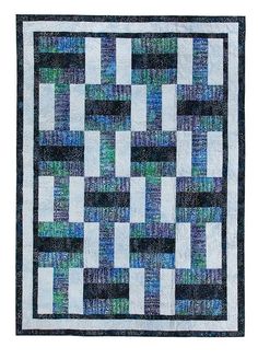 a blue and black quilt with squares on it