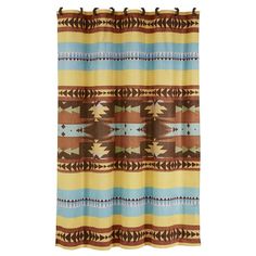 a shower curtain with an southwestern pattern on the front and side panels in brown, blue,