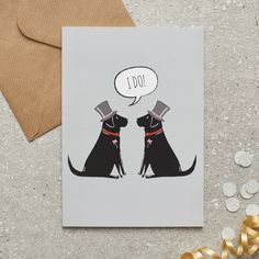 a greeting card with two dogs talking to each other, one has a thought bubble above its head