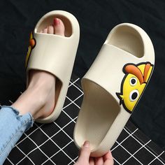 The Cartoon Duck Print Chunky Slides are a fun pair of slides everyone will enjoy! With two style variations, the quacking duck sits on the top of the slides or on the sides. The Cartoon Duck Print Chunky Slides are easy to slip on and off and are very comfortable! Walk-in style! FEATURES: Style Open Toe Season Spring/Summer Sole Flat Vamp material EVE COMFORTABLE MATERIAL: The Cartoon Duck Print Chunky Slides are made of high-density material. These are light, soft, breathable, and waterproof, Playful Non-slip Slip-on Slides, Playful Open Toe Slides For Spring, Fun Slide Slippers For Spring, Fun Non-slip Slides For Spring, Spring Fun Slip-on Slides, Spring Slip-on Slides In Fun Style, Fun Spring Slip-on Slides, Spring Slip-on Slides With Fun Style, Playful Synthetic Slides For Spring