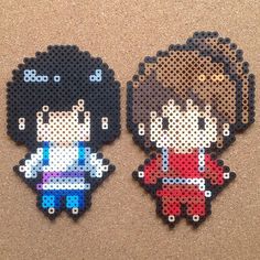 two pieces of perler bead art depicting anime characters, one in red and the other in blue