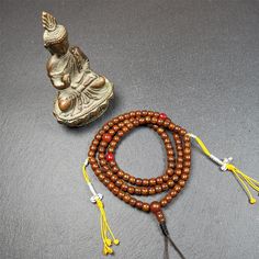 This old lotus seed mala was handmade from tibetan crafts man in Baiyu County,about 20 years old. It's composed of 108 lotus seed beads,then add some agate beads,1 pair of silver bead counters,and agate guru bead on it. Traditional Beaded Bracelets For Meditation With 108 Beads, Traditional 8mm Beads Mala For Puja, Polished Beads Mala For Puja, Traditional 8mm Mala Beads For Puja, Spiritual Brown Mala With Polished Beads, Adjustable Mala With 8mm Beads For Puja, Traditional Mala With Natural Stones For Meditation, Brown Spiritual Mala With Polished Beads, Brown Polished Beads Mala For Meditation