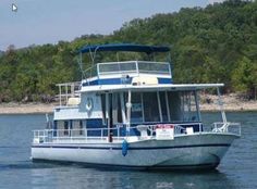 a blue and white boat in the water