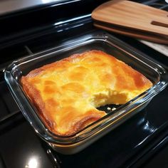 a casserole dish sitting on top of an oven