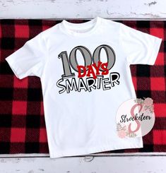 a white shirt with the words 100 days smarter printed on it