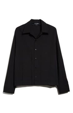 The 'La Casa' collection's minimalist geometries take shape in the textured panel construction of this boxy button-up with extralong sleeves. Front button closure Spread collar Long sleeves with button cuffs 65% polyester, 35% cotton Dry clean Made in France Designer Clothing Nordstrom Store, Fabric Gifts, Free Fabric, Black Fits, Clothing Items, Black Shirt, Button Up Shirts, Designer Clothing, Button Up