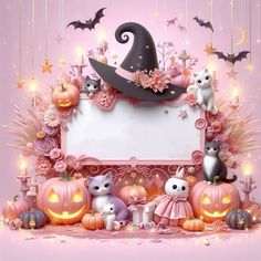 a halloween scene with pumpkins, cats and a witch's hat on it