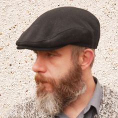 Traditional Irish tweed flat cap - made by me! Flat cap story: In 1571 Queen Elizabeth I sought to stimulate trade in the Irish and English wool trade, by passing an act obliging males over six years of age (except for nobility and persons of degree) to wear caps of wool manufacture on force of a fine (3/4d per day). This law further established the flat cap as a staple of Irish/English working class clothing culture. Even though the law was repealed 26 years later the convention was established Classic Outdoor Fitted Hat With Six-panel Design, Classic Six-panel Outdoor Fitted Hat, Classic Outdoor Fitted Cap, Classic Outdoor Six-panel Fitted Hat, Classic Fitted Hat With Flat Bill For Outdoor, Classic Black Flat Cap, Black Curved Brim Fitted Hat For Winter, Black Fitted Hat With Curved Brim For Winter, Winter Black Fitted Hat With Curved Brim