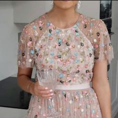 Bhldn Needle & Thread Dress $600 Size Us 4-- Runs Small-- Please See Measurements Bust- 32 Inches Waist- 26 Inches Length- 45 Inches Selling In Pink With Colorful Sequins-- Also Shown In Other Colors Open Back Beautiful Brand New, Never Worn, Only Tried On This Is My Lowest Price, Thanks! Don't Forget To Check Out My Other Bhldn And Needle & Thread Dresses! Spring Embellished Dress For Wedding Guest, Summer Embellished Dress For Wedding Guest, Glamorous Short Sleeve Maxi Dress For Spring, Spring Embellished Evening Dress, Pink Floral Embellished Maxi Dress For Parties, Elegant Embellished Dress For Garden Party, Embellished Short Sleeve Evening Dress For Spring, Feminine Short Sleeve Evening Dress For Spring, Spring Wedding Guest Dress With Sequins