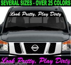 a truck with the words look pretty play dirty on it's front grills