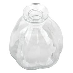 a clear glass vase with a ring on the top and bottom, sitting in front of a white background