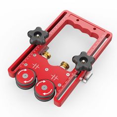 an image of a red tool holder with two screws on it's side