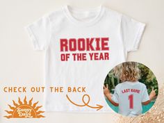 a t - shirt with the words rocket of the year printed on it and an image of a child's back