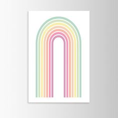 a rainbow print with the letter n in pastel colors on a white wall above it