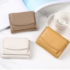 SPECIFICATIONS Lining Material: POLYESTER Main Material: PU Material Composition: PU Wallet Length: short Style: fashion Closure Type: No Zipper Item Type: Wallet Decoration: FLOWERS Item Weight: 51g Item Width: 2cm Interior: Card Holder Gender: WOMEN Wallets: Standard Wallets [20240326] Beige Trifold Wallet With Card Slots For Daily Use, Mini Money, Wallets For Girls, Soft Leather Purse, Small Leather Wallet, Luxury Clutch, Short Wallet, Coin Bag, 19 Days