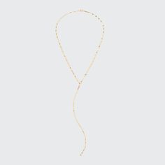 LANA Y-drop chain necklace. 14-karat yellow gold flat link chain. Approx. 16"L; 7.1"L drop. Lobster clasp. Imported. Gold-tone Lariat Chain Necklace, Gold-tone Lariat Chain Necklaces, Modern Gold Long Drop Necklace, Formal Long Drop Chain Necklaces, Yellow Gold Link Lariat Necklace, 14k Gold Lariat Chain Necklace, Gold Lariat Necklace With Long Drop Chain, Minimalist Lariat Chain Necklace, Modern Gold Drop Necklace With Adjustable Chain