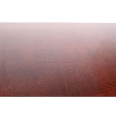 a wooden table covered in thick fog and light brown woodgrain with white trim