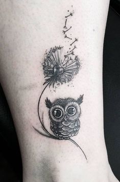 an owl with dandelions tattoo on the ankle