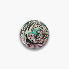 a button that has graffiti on it