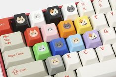 the colorful keyboard has many cats on it