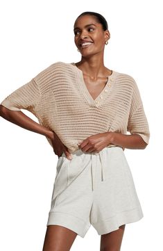 A wide V-neck and dropped shoulder seams relax the vibe of this texturally interesting top. 23" length ( size Medium) Split neck Elbow-length sleeves 100% cotton Hand wash, dry flat Imported Sheer Knit, Ribbed Dress, Short Sleeve Sweater, Crochet Blouse, Beautiful Knitting, Oversized Silhouette, Open Knit, Dress Outfit, Elbow Length Sleeve