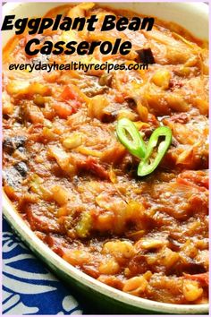 an eggplant bean casserole in a white bowl