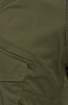 Stretch-cotton pants in a tapered profile rock a modern, utilitarian look with cargo-style pockets and ergonomic seaming for a more active fit. 32" inseam; 14" leg opening; 10" front rise; 15" back rise (size 32) Zip fly with button closure Side slant pockets; back flap pockets; side cargo pockets 97% cotton, 3% elastane Machine wash, dry flat Imported Utility Cargo Pants With Tapered Leg, Outdoor Tapered Leg Cargo Jeans With Patch Pockets, Outdoor Tapered Leg Work Pants With Cargo Pockets, Military Style Cotton Work Pants With Multiple Pockets, Outdoor Tapered Leg Cargo Pants With Hip Pockets, Utility Cargo Pants With Functional Pockets For Work, Workwear Cargo Pants With Functional Pockets And Tapered Leg, Utility Style Cotton Cargo Pants With Functional Pockets, Tapered Leg Cargo Pants With Functional Pockets For Workwear