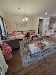 a living room filled with lots of furniture