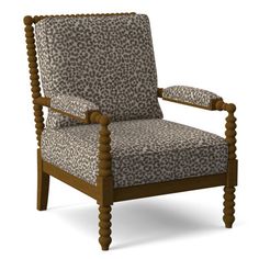 a leopard print upholstered chair with wooden legs and arm rests on an isolated white background