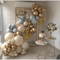 a room filled with lots of balloons and cake