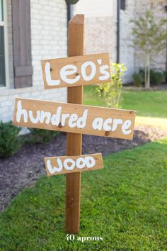 a wooden sign that says leo's hundred are woop