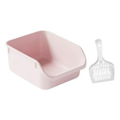 a white and pink dish with a grater next to it on a white background