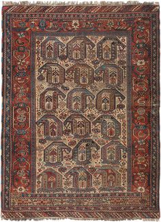 an antique persian rug with various colors and designs on the border, including red, blue,