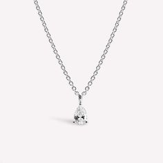 Drape sophisticated women in elegance with our Solo Pear Necklace – a pinnacle of refinement. A single, dazzling gem captivates with brilliance, ensuring a look of unparalleled allure. Metal: 14K Gold Vermeil Pendant dimensions: 3.3 mm / 0.13" x 6.4 mm / 0.25" Chain Width: 1 mm / 0.04" Stone Type: Joopita® StoneTotal length: 40 cm with extensions from 40 cm to 45 cm (15.75" - 17.72") Weight: 2.5 g Sophisticated Women, Wear Necklaces, 14kt Gold, Gold Vermeil, Sterling Silver Pendants, Beautiful Necklaces, Pear, Silver Necklace, Ring Size