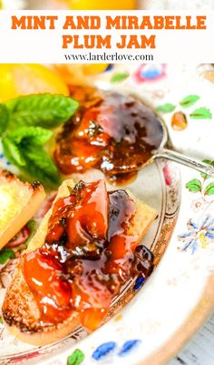 two pieces of bread with strawberry jam on them and basil leaves in the background text reads mini and mirabele plum jam