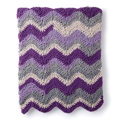 a crocheted dishcloth with purple and grey chevrons