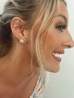 "Introducing Elegant Pearl and Rhinestone Earring Studs for any occasion! Our earrings are perfect for your special day or for adding a touch of elegance to your everyday look. Our collection features pearl and rhinestone studs crafted from high quality material for maximum brilliance. Whether you're looking for a classic style or something a bit more modern, our earrings are sure to make you stand out. Make a statement with these beautiful pieces and add a touch of sophistication to any outfit. Pearl Bridal Earrings With Diamond Accents For Wedding, Bridal Pearl Earrings With Diamond Accents For Wedding, Wedding Pearl Earrings With Diamond, Wedding Pearl Diamond Earrings, Pearl Earrings With Rhinestones For Wedding, Sparkling Pearl Earrings For Wedding, Wedding Diamond Earrings With Rhinestones, Wedding Cubic Zirconia Clip-on Earrings, Gold Pearl Earrings With Rhinestones