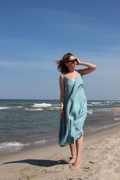 Easy and comfortable linen slip dress for hot summer days at the beach. Perfect dress for beach or dinner party in the city, just change accessories. Click through to see more simple linen dresses. #summerdress #linendress #beachdress Summer Maxi Sundress For Daywear, Summer Maxi Length Sundress For Daywear, Summer Maxi Dress For Daywear, Bohemian Linen Dress For Summer Day Out, Bohemian Linen Dress For Summer, Linen Dresses With Spaghetti Straps For Beach Season, Spring Beach Midi Dress Relaxed Fit, Breezy Beach Midi Dress With Spaghetti Straps, Breezy Sleeveless Relaxed Fit Maxi Dress