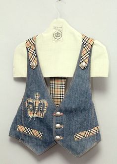 DENIM VEST WITH CROWN, UNIQUE PRODUCT, COTTON DENIM MATERIAL, SIZE S/36 EU, PRODUCT DIMENSIONS: WAIST 90CM, LENGTH 57CM, PRODUCT CODE MBA014http://razvandumitran.ro/shop/man-clothes-c-237/denim-vest-with-crown-p-487.html We are a team of specialists in the field of fashion design. We have formed in artistic schools, and we have worked with specialists in the field. We are approaching the fashion field with new and original creations that surely will attract your eyes where you wear them. The tra Summer Denim Patchwork Vest, Medium Wash Patchwork Denim Vest, Fitted Patchwork Denim Vest, Blue Sleeveless Patchwork Vest, Blue Denim V-neck Vest, We Are A Team, Denim Vest, Shop Mens Clothing, Denim Fashion