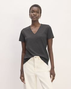 About This Style. This piece features a boyish cut with a slim, feminine fit, v-neck, and made of premium, mid-weight organic cotton. Relaxed Fit Cotton V-neck Top, Basic Cotton V-neck Top, Everlane Casual T-shirt, Casual Cotton V-neck Top For Work, Everyday Cotton V-neck Top, V Neck Tee, Birthday Gift, Organic Cotton, V Neck