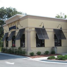 an empty street in front of a restaurant